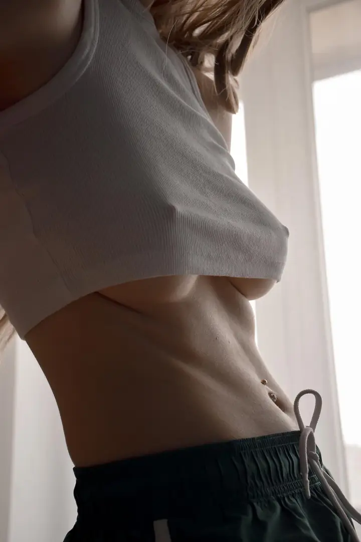 Delicious underboob peek and a killer smile from your favorite supervisor