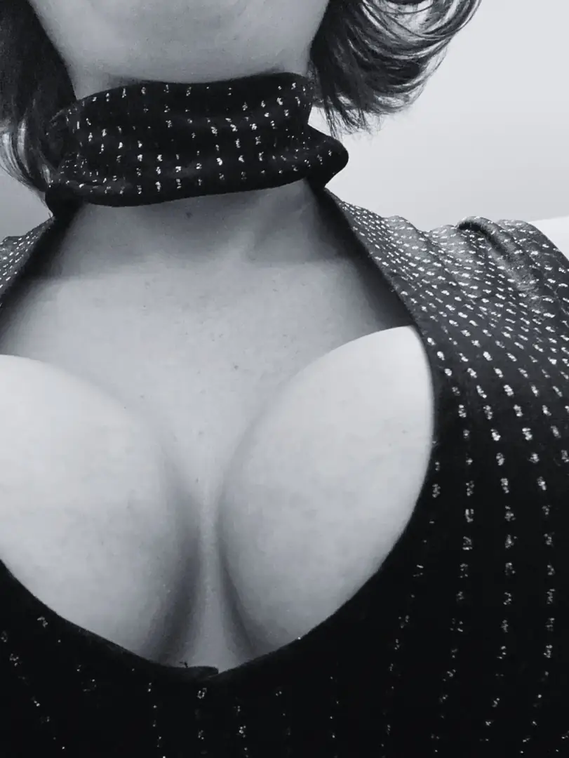 Juicy delicious cleavage in sexy black and white for your distraction