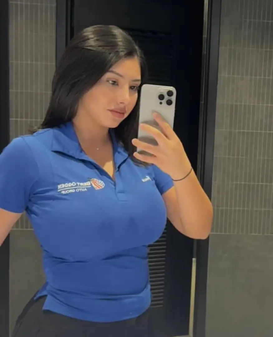 Kat Dennings vibes with big glasses and a bra line that says it all