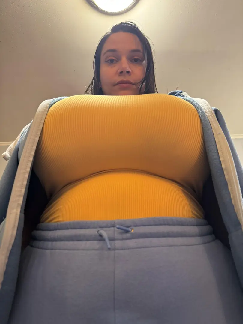 Massive Redhair Bombshell With A Millennial Body And Heavy Balloons Stretching This 2005 Style Tight Shirt