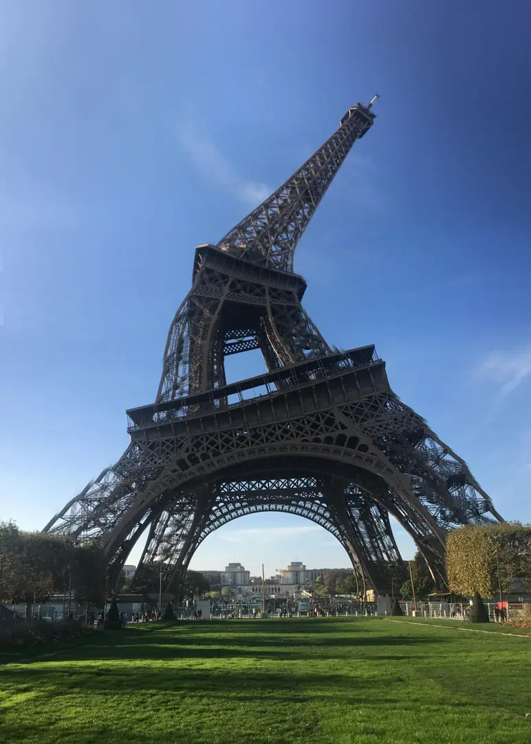 Taking the hit from behind in Paris while the trash bin flips its lid for my back pocket