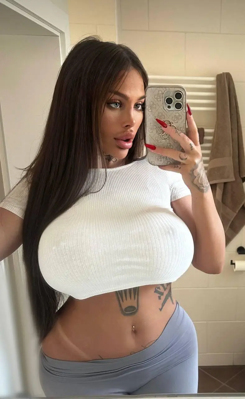 Total German babe in a tight leather dress ready for you to carry me to bed