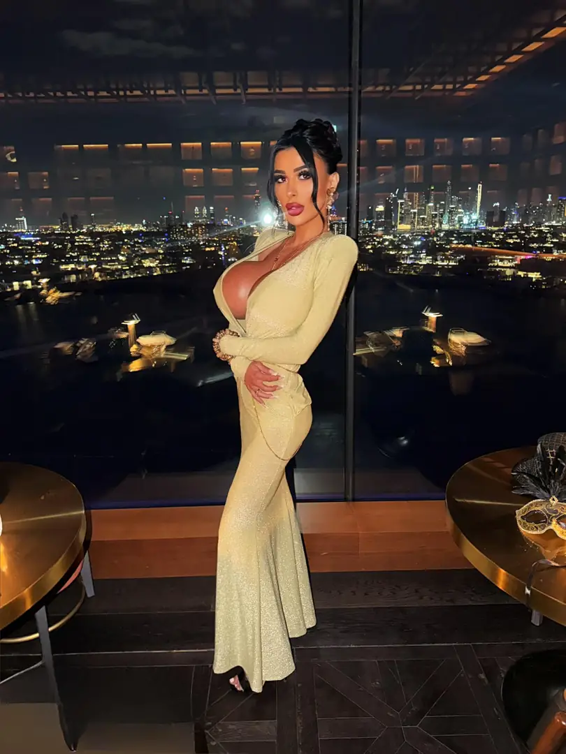 Your Professional Bimbo in a Stunning New Year’s Dress Ready for Fireworks